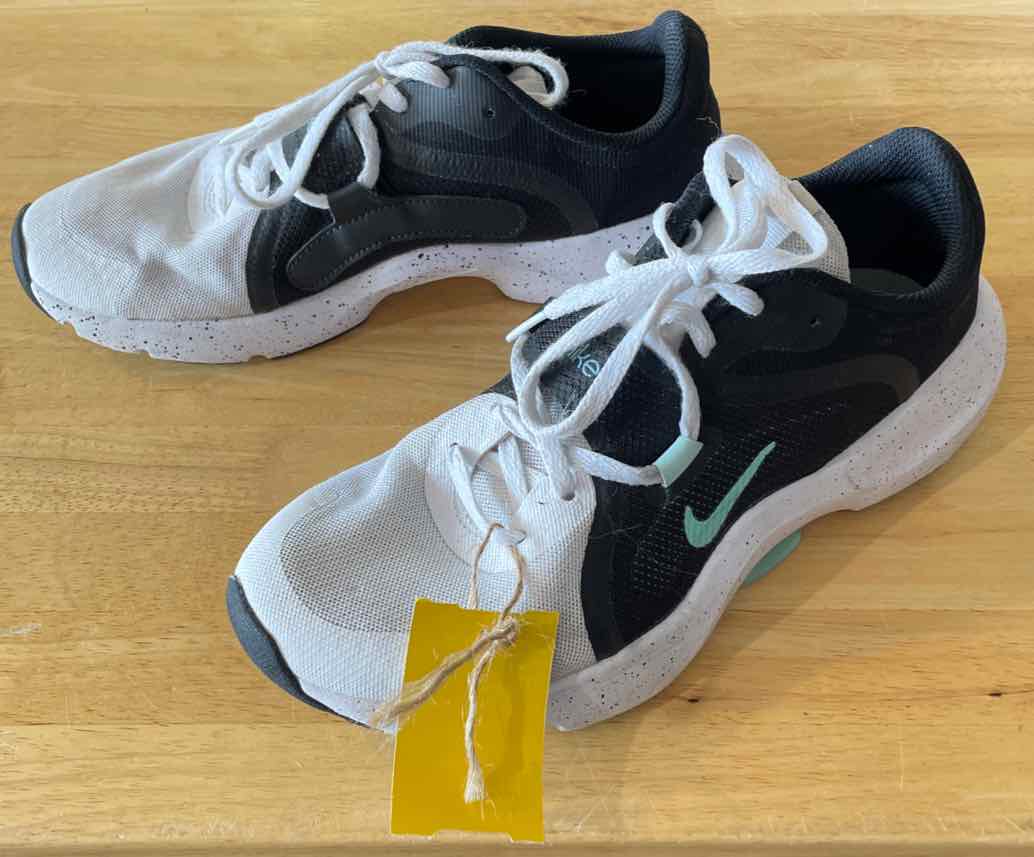 Women's Shoe Size 8.5 Nike Black and White Running Shoes